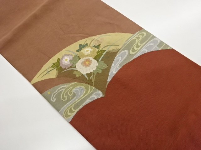 綴れ花葉に流水模様織出し名古屋帯